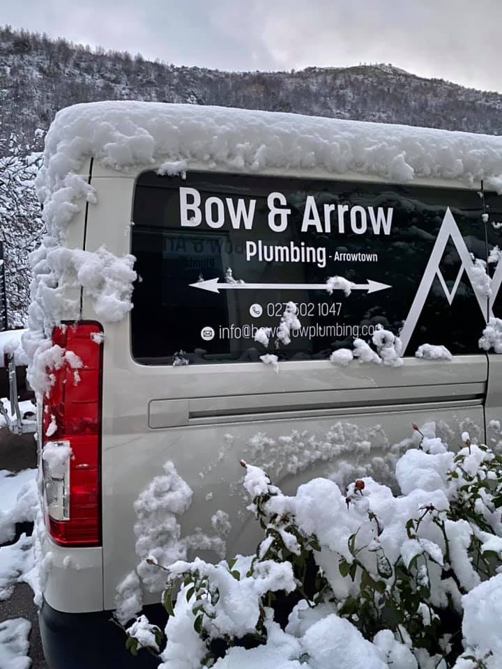 portrait friendly and professional plumber smiling